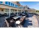 Expansive outdoor patio with modern furniture and stunning views of the building architecture at 1614 Live Oak Park, Seabrook Island, SC 29455