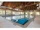 Indoor pool with natural light, clear water, and an attached eight-foot deep end section at 1614 Live Oak Park, Seabrook Island, SC 29455