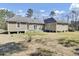 Exterior view of the home showcasing the backyard and design of the house at 162 Wal Flo Ln, Moncks Corner, SC 29461