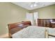 Bedroom showing a wooden bed frame with drawers, accompanied by a wooden dresser, creating a vintage style at 162 Wal Flo Ln, Moncks Corner, SC 29461