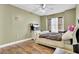 Bedroom featuring a bed, a TV on a dresser, a window with curtains, and minimalist decor at 162 Wal Flo Ln, Moncks Corner, SC 29461