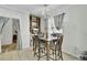 Eat-in kitchen featuring a table with seating for four and natural light at 162 Wal Flo Ln, Moncks Corner, SC 29461