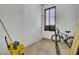 Unfinished garage area with a window and a bike at 162 Wal Flo Ln, Moncks Corner, SC 29461
