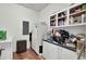 Functional laundry room with washer, dryer hookups, built in cabinet storage, and utility sink at 162 Wal Flo Ln, Moncks Corner, SC 29461