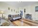 Cozy living room with hardwood floors and comfortable seating arrangement at 162 Wal Flo Ln, Moncks Corner, SC 29461
