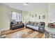 Comfortable living room featuring hardwood floors, neutral walls, and two couches at 162 Wal Flo Ln, Moncks Corner, SC 29461