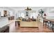 Cozy living room with wood floors, ceiling fan, and access to kitchen and dining area at 162 Wal Flo Ln, Moncks Corner, SC 29461