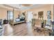 Spacious main bedroom boasts tray ceilings, hardwood floors, and ensuite bathroom access at 162 Wal Flo Ln, Moncks Corner, SC 29461
