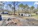 Property showcasing the exterior with various items scattered across the yard at 162 Wal Flo Ln, Moncks Corner, SC 29461