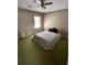 Neutral bedroom with a ceiling fan, window, and soft carpet at 1770 Skinner Ave, Charleston, SC 29407