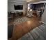 Spacious living room with hardwood floors, television, and comfortable seating at 1770 Skinner Ave, Charleston, SC 29407
