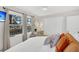Bright bedroom features a large window and a neutral color palette at 1950 Culver Ave, Charleston, SC 29407
