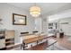 Cozy dining room featuring a wooden table and stylish lighting fixture at 1950 Culver Ave, Charleston, SC 29407