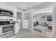 Modern kitchen with stainless steel appliances and an open layout to the living room at 1950 Culver Ave, Charleston, SC 29407