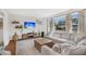 Bright living room with a large window, comfortable seating, and stylish decor at 1950 Culver Ave, Charleston, SC 29407
