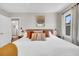 Comfortable main bedroom with natural light, neutral color palette, and stylish bedding and decor at 1950 Culver Ave, Charleston, SC 29407