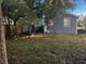 Expansive backyard featuring mature trees and a basketball hoop at 2011 Hugo Ave, North Charleston, SC 29405