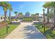 Beautiful clubhouse entrance with manicured landscaping and inviting walkway at 2012 Barn Swallow Rd, Summerville, SC 29483