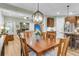 Open concept, shows the dining room that flows seamlessly to the living room and kitchen at 2012 Barn Swallow Rd, Summerville, SC 29483