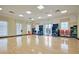 Bright fitness room featuring hardwood floors, natural light, and ample space for activities at 2012 Barn Swallow Rd, Summerville, SC 29483