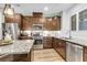 Gourmet kitchen showcasing stainless steel appliances, granite counters, and custom cabinets at 2012 Barn Swallow Rd, Summerville, SC 29483