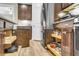 Gourmet kitchen featuring stainless steel appliances, granite countertops, and convenient pull-out shelving in the cabinetry at 2012 Barn Swallow Rd, Summerville, SC 29483
