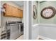 Laundry room featuring a side-by-side washer and dryer set and upper cabinets at 2012 Barn Swallow Rd, Summerville, SC 29483