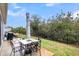 Outdoor patio with dining table and chairs, perfect for entertaining at 2012 Barn Swallow Rd, Summerville, SC 29483