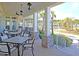 Inviting patio with tables and chairs, offering a relaxing outdoor dining space at 2012 Barn Swallow Rd, Summerville, SC 29483