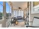 Relaxing screened porch with cozy seating, ceiling fan, and tranquil views at 2012 Barn Swallow Rd, Summerville, SC 29483