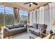 Inviting screened-in porch with ample seating and peaceful outdoor ambiance at 2012 Barn Swallow Rd, Summerville, SC 29483