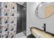 This bathroom features modern fixtures, a shower, and a unique vessel sink at 2124 Booker St, Charleston, SC 29405