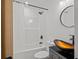 This bathroom boasts modern fixtures and a unique vessel sink on a vanity cabinet at 2124 Booker St, Charleston, SC 29405