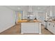 Bright kitchen features stainless appliances, butcher block countertops, and eat-in island at 2124 Booker St, Charleston, SC 29405