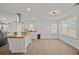 Bright kitchen features stainless appliances, butcher block countertops, and eat-in island at 2124 Booker St, Charleston, SC 29405