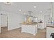 This kitchen features white cabinets, butcher block countertops, and stainless steel appliances at 2124 Booker St, Charleston, SC 29405