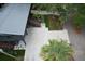 Aerial view showcasing the home, landscaped yard, and brick driveway, highlighting its prime location and curb appeal at 219 Forest Trl, Isle of Palms, SC 29451