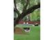 Backyard with a pool and sandpit underneath a large tree, offering a relaxing outdoor retreat at 219 Forest Trl, Isle of Palms, SC 29451