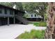Charming home exterior with staircase and hardscaped yard, blending beauty and functionality seamlessly at 219 Forest Trl, Isle of Palms, SC 29451