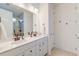 Well-lit bathroom with double vanity, modern fixtures, and ample counter space at 2317 Chisol Plow St, Mount Pleasant, SC 29466