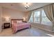 Comfortable bedroom with natural light and hardwood floors at 2317 Chisol Plow St, Mount Pleasant, SC 29466