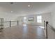 Bright, open bonus room with hardwood floors and modern finishes exudes comfort at 2317 Chisol Plow St, Mount Pleasant, SC 29466