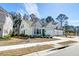 Charming home exterior with well-maintained landscaping and a two-car garage at 2317 Chisol Plow St, Mount Pleasant, SC 29466