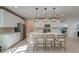 Bright, modern kitchen features an island with bar seating, stainless steel appliances, and ample cabinet space at 2317 Chisol Plow St, Mount Pleasant, SC 29466