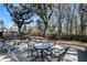 Cozy backyard patio featuring a table and seating perfect for outdoor gatherings at 2317 Chisol Plow St, Mount Pleasant, SC 29466