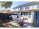 Private backyard with patio seating, a small storage shed, and a view of the home's rear at 2416 Kings Gate Ln # 403, Mount Pleasant, SC 29466