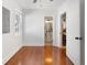 Spacious bedroom with hardwood floors leading to a bathroom and another room at 2714 W Surrey Dr, North Charleston, SC 29405