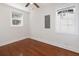 Bright bedroom with neutral walls, ceiling fan and hardwood flooring at 2714 W Surrey Dr, North Charleston, SC 29405