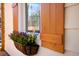 Window detail featuring exterior shutter and flower box at 2714 W Surrey Dr, North Charleston, SC 29405