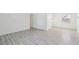 Spacious living room with neutral walls and modern light-gray flooring and a bright window at 28 Elmora Ave, Goose Creek, SC 29445